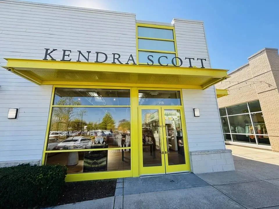 Yellow Retail Storefront Frames and Entry Canopy